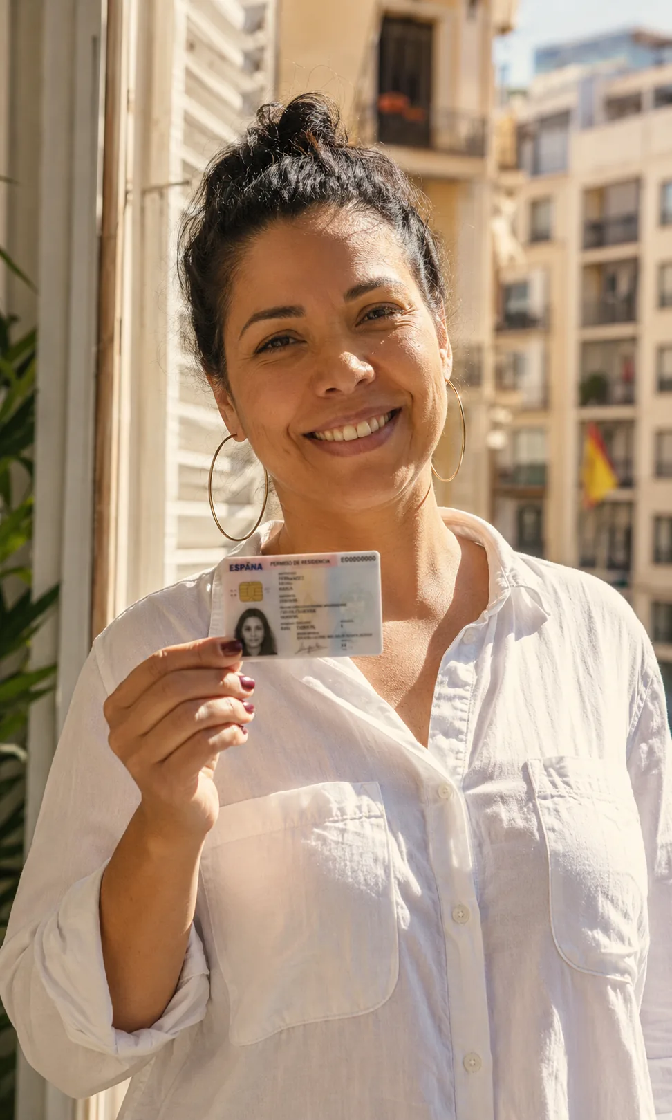 Tarjeta de residencia (TIE) obtenida tras la concesión del arraigo en España